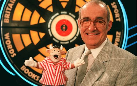 jim bowen bullseye gif  Three two-person teams competed on each episode, with one throwing darts and the other answering questions